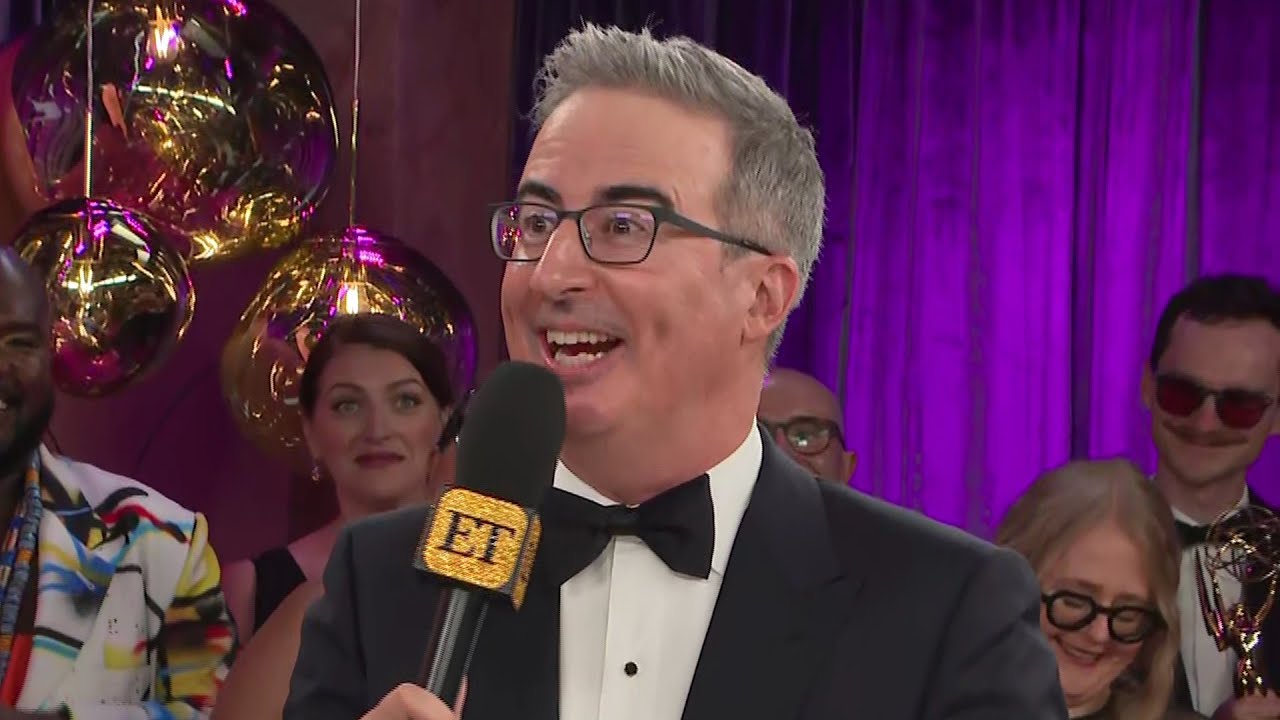 John Oliver's 77 Staffers Crash His Emmys Interview After 23rd Win (Exclusive)